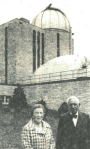 man and woman in front of planetarium